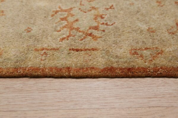 Curled edge of a decorative rug