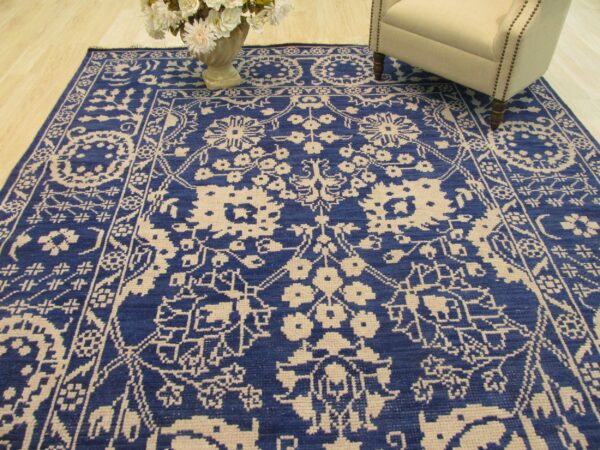 Intricate blue and white floral rug