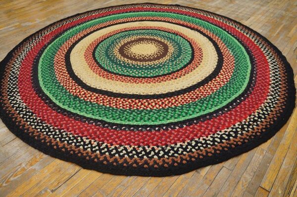 Antique american braided folk art rug 9' round, jewel tone colors - detail view 1