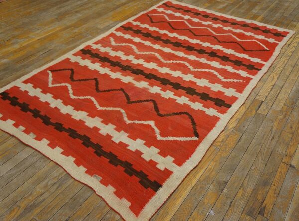 Antique american navajo rug 4'4"ã—7'2" bright red ground, ivory border, transitional period, circa 1890 - detail view 1