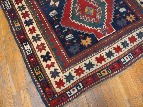 Antique caucasian kazak rug 4'×7'7" blue medallion design, 1890s 3 Antique caucasian kazak rug 4'×7'7" blue medallion design, 1890s - detail view 2