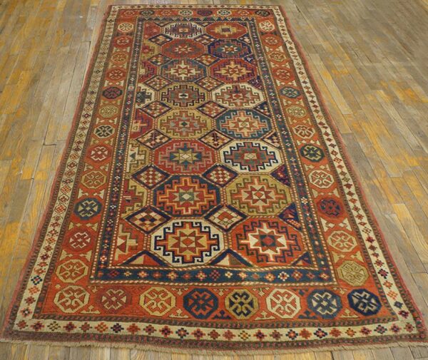 Antique caucasian kazak rug 4'×8'2" multi geometric, rose pink border, circa 1890 2 Antique caucasian kazak rug 4'×8'2" multi geometric, rose pink border, circa 1890 - detail view 1