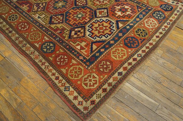 Antique caucasian kazak rug 4'×8'2" multi geometric, rose pink border, circa 1890 3 Antique caucasian kazak rug 4'×8'2" multi geometric, rose pink border, circa 1890 - detail view 2