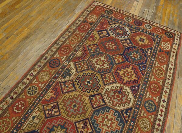 Antique caucasian kazak rug 4'×8'2" multi geometric, rose pink border, circa 1890 4 Antique caucasian kazak rug 4'×8'2" multi geometric, rose pink border, circa 1890 - detail view 3
