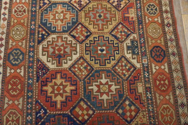 Antique caucasian kazak rug 4'×8'2" multi geometric, rose pink border, circa 1890 8 Antique caucasian kazak rug 4'×8'2" multi geometric, rose pink border, circa 1890 - detail view 7