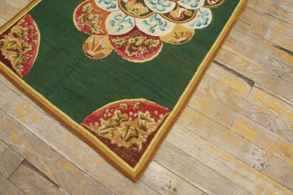 Antique european needlepoint rug, green floral central pattern - detail view 2
