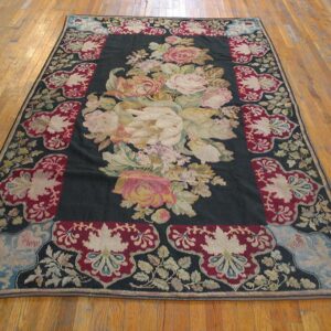 Antique French Needlepoint Carpet 5'2"×8'8" Black with Roses, Raspberry Border, Circa 1890 - detail view 1