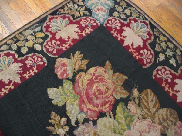 Antique french needlepoint carpet 5'2"×8'8" black with roses, raspberry border, circa 1890 - detail view 4