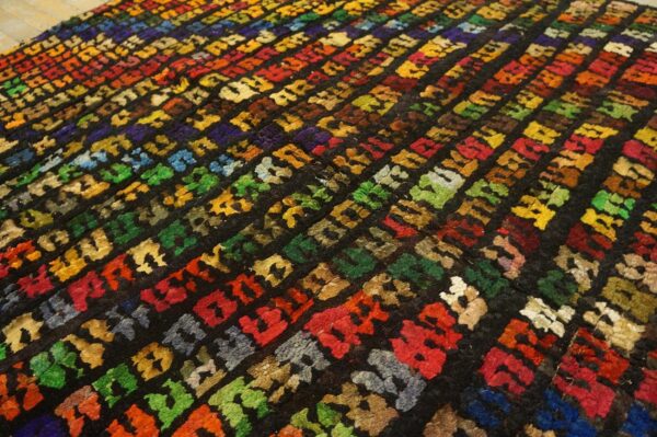 Antique jerusalem carpet 5'6"×7'9" black field, hand-knotted wool, 1930s 5 Antique jerusalem carpet 5'6"×7'9" black field, hand-knotted wool, 1930s - detail view 4