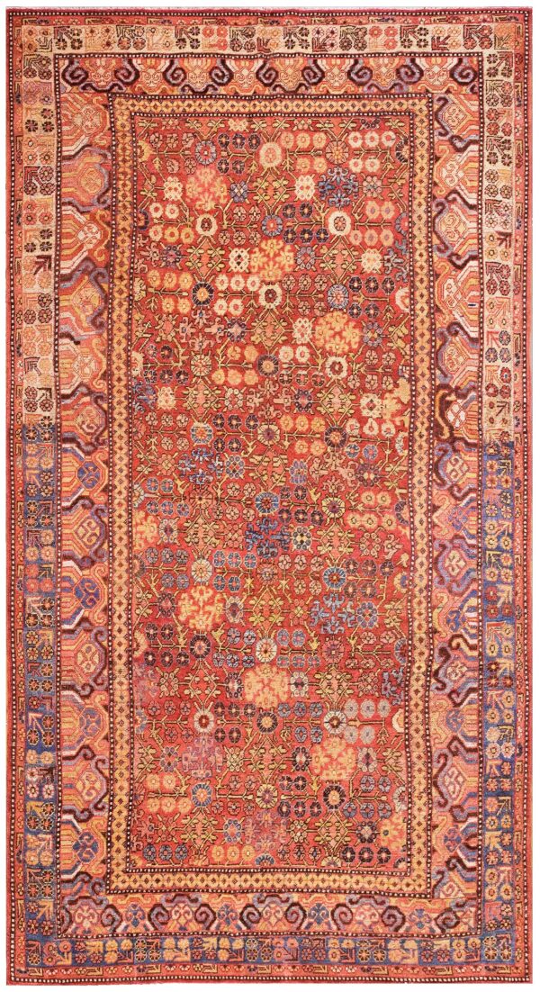 Antique khotan carpet 6'6"×11'6" persimmon & light blue, circa 1800 1 Antique khotan carpet 6'6"×11'6" persimmon & light blue, circa 1800