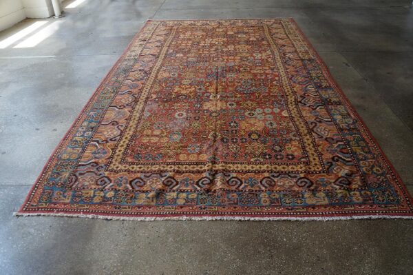 Antique khotan carpet 6'6"×11'6" persimmon & light blue, circa 1800 2 Antique khotan carpet 6'6"×11'6" persimmon & light blue, circa 1800 - detail view 1