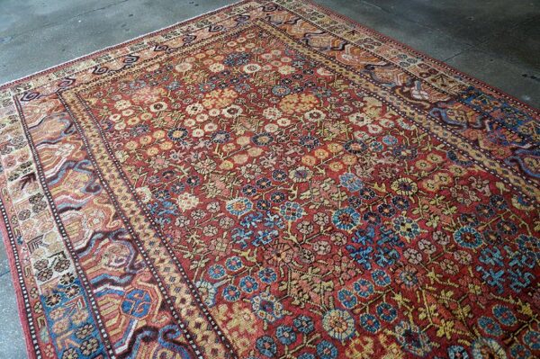 Antique khotan carpet 6'6"×11'6" persimmon & light blue, circa 1800 6 Antique khotan carpet 6'6"×11'6" persimmon & light blue, circa 1800 - detail view 5