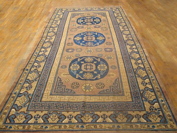 Antique khotan carpet 6'3"×13'5" plum & yellow medallion, circa 1870, east turkestan - detail view 1