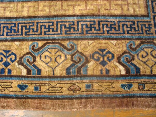 Antique khotan carpet 6'3"×13'5" plum & yellow medallion, circa 1870, east turkestan - detail view 3