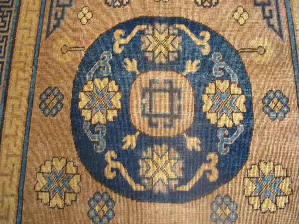 Antique khotan carpet 6'3"×13'5" plum & yellow medallion, circa 1870, east turkestan - detail view 4