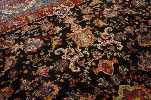 Antique persian bakhtiari carpet 15'6"×16'10" black field, teal blue border, mid 20th century, circa 1940 - detail view 3