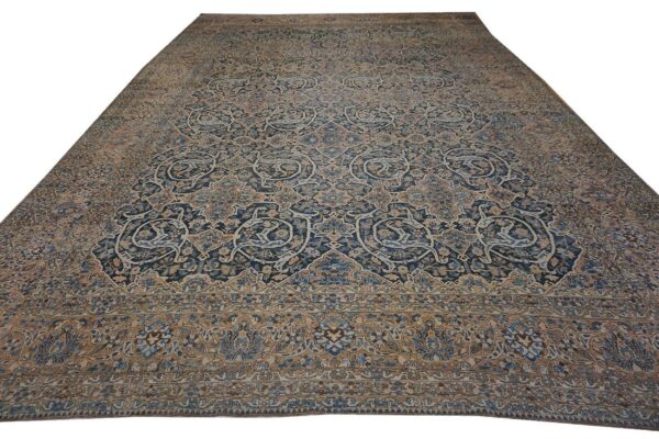 Antique persian bakhtiari rug 12'×18' dark blue, peach border, circa 1920 - detail view 1