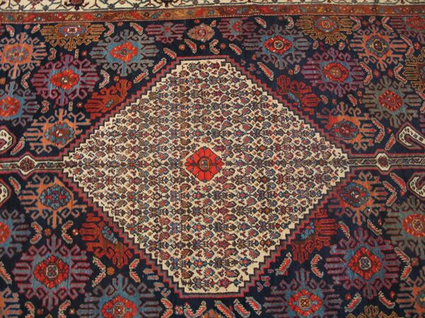 Antique persian bibikabad carpet 7'6"×17'4" dark blue medallion, ivory border, circa 1920 - detail view 3