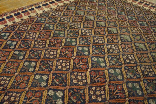 Antique persian formal ne rug 13'6"×16'10" navy floral figural, 1850s - detail view 4