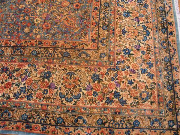 Antique persian kirman carpet 13'10"×16'8" blue floral, hand-knotted wool, 1920s - detail view 1