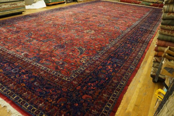 Antique persian kirman carpet 15'×30' red floral, hand-knotted wool, 1930s 6 Antique persian kirman carpet 15'×30' red floral, hand-knotted wool, 1930s - detail view 5