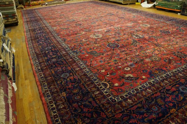 Antique persian kirman carpet 15'×30' red floral, hand-knotted wool, 1930s 7 Antique persian kirman carpet 15'×30' red floral, hand-knotted wool, 1930s - detail view 6