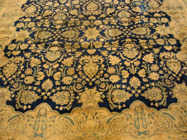 Antique s. E. Persian kirman carpet 11'10"×23'10" navy floral, rose border, circa 1920 - detail view 9