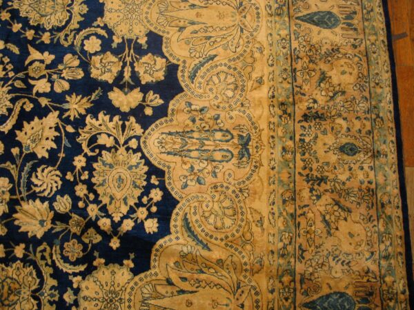 Antique s. E. Persian kirman carpet 11'10"×23'10" navy floral, rose border, circa 1920 - detail view 11