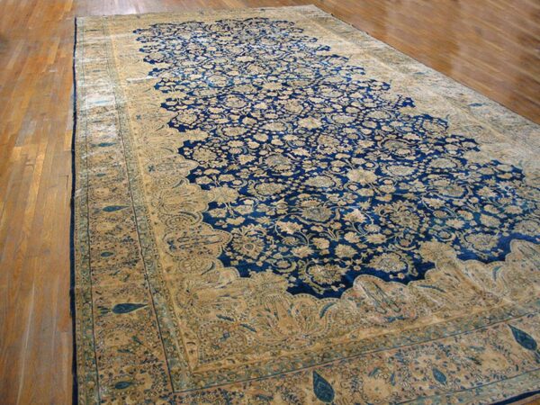 Antique s. E. Persian kirman carpet 11'10"×23'10" navy floral, rose border, circa 1920 - detail view 1