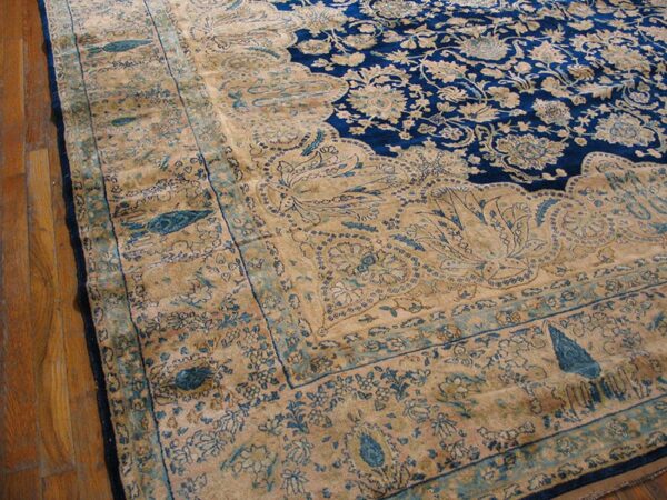 Antique s. E. Persian kirman carpet 11'10"×23'10" navy floral, rose border, circa 1920 - detail view 2