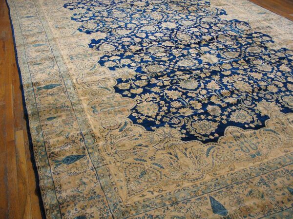 Antique s. E. Persian kirman carpet 11'10"×23'10" navy floral, rose border, circa 1920 - detail view 3