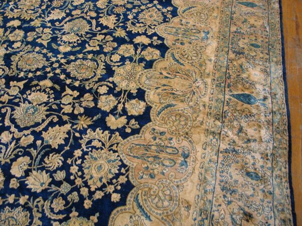Antique s. E. Persian kirman carpet 11'10"×23'10" navy floral, rose border, circa 1920 - detail view 4