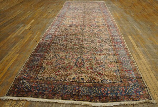 Antique s. E. Persian kirman gallery carpet 5'10"×17'10" beige field, blue border, circa 1920 - detail view 1
