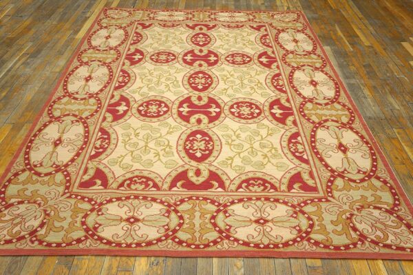 Contemporary handwoven wool needlepoint rug â€” beige ground - detail view 1