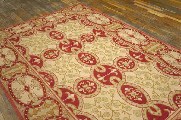 Contemporary handwoven wool needlepoint rug â€” beige ground - detail view 2