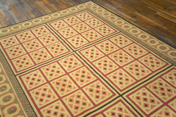 Contemporary handwoven wool needlepoint rug â€” beige ground, decorative square pattern - detail view 2