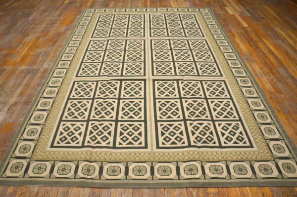Contemporary handwoven wool needlepoint rug â€” beige ground, diamond pattern - detail view 1