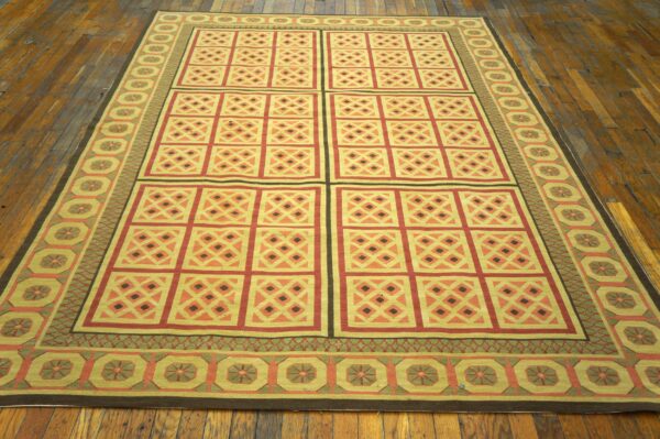 Contemporary handwoven wool needlepoint rug — beige ground, geometric pattern - detail view 1