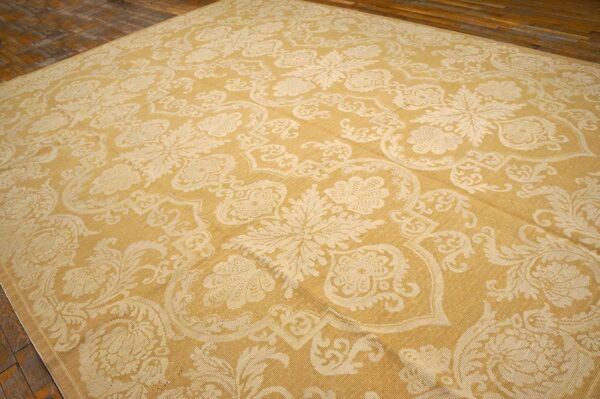 Contemporary handwoven wool needlepoint rug â€” beige-ivory color - detail view 2