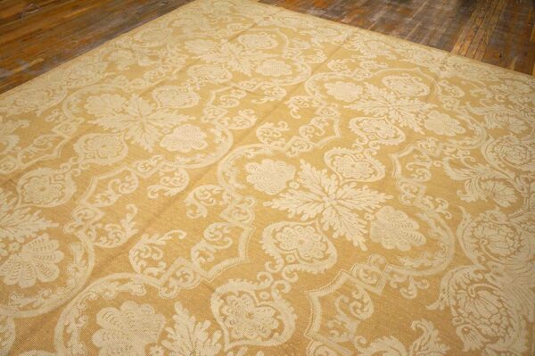 Contemporary handwoven wool needlepoint rug â€” beige-ivory color - detail view 5