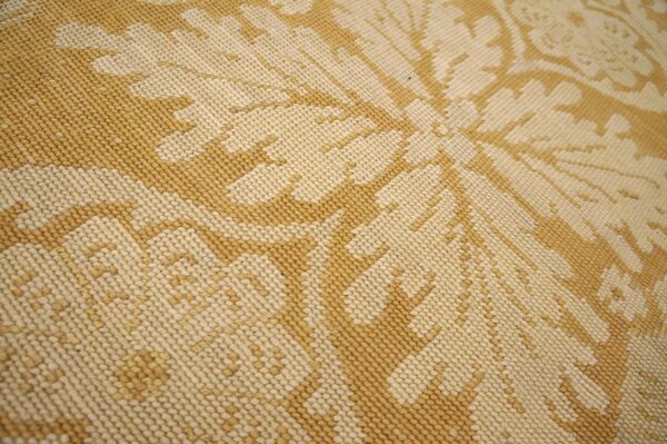 Contemporary handwoven wool needlepoint rug â€” beige-ivory color - detail view 8