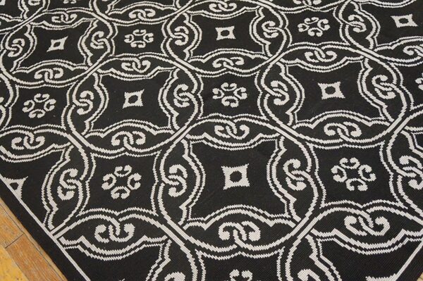 Contemporary handwoven wool needlepoint rug — black geometric pattern - detail view 2