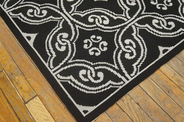 Contemporary handwoven wool needlepoint rug — black geometric pattern - detail view 7