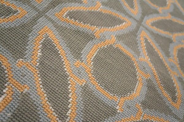 Contemporary handwoven wool needlepoint rug — blue & orange circles geometric - detail view 4
