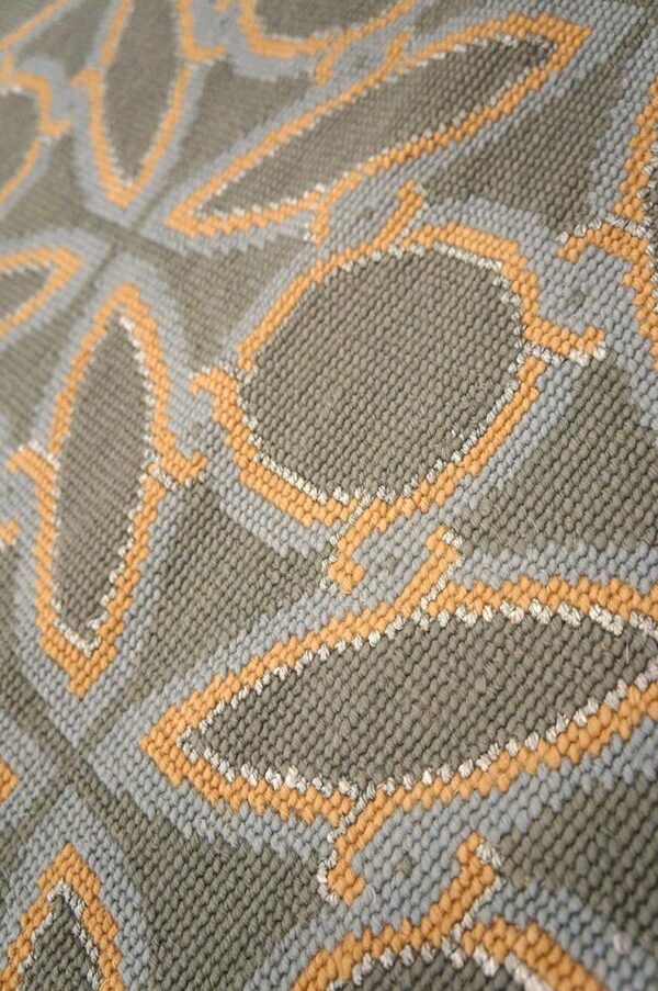 Contemporary handwoven wool needlepoint rug — blue & orange circles geometric - detail view 5