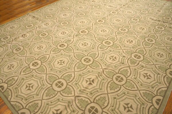 Contemporary handwoven wool needlepoint rug — four-star motif - detail view 2