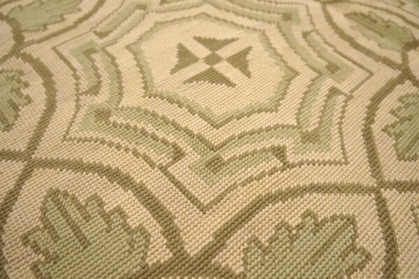 Contemporary handwoven wool needlepoint rug — four-star motif - detail view 6