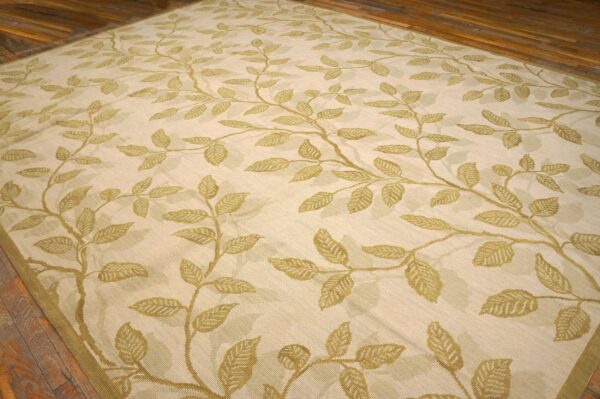 Contemporary handwoven wool needlepoint rug â€” ivory ground, floral composition - detail view 2