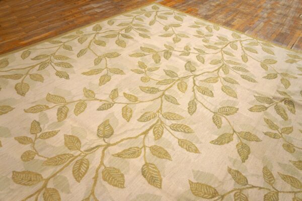 Contemporary handwoven wool needlepoint rug â€” ivory ground, glamorous branches - detail view 3