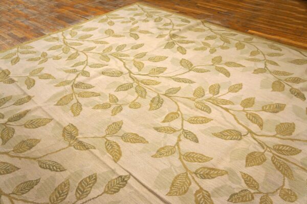 Contemporary handwoven wool needlepoint rug â€” ivory ground, glamorous branches - detail view 4